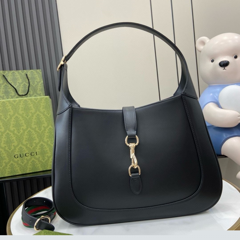 G*u*i top handle bags